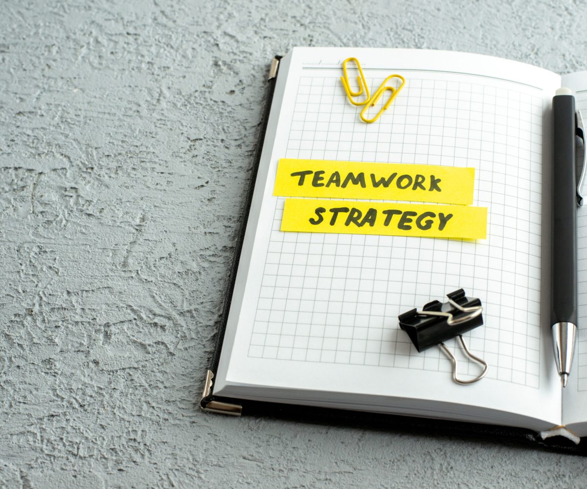 front-view-of-teamwork-strategy-writings-pen-and-o-2026-03-18-11-04-49-utc